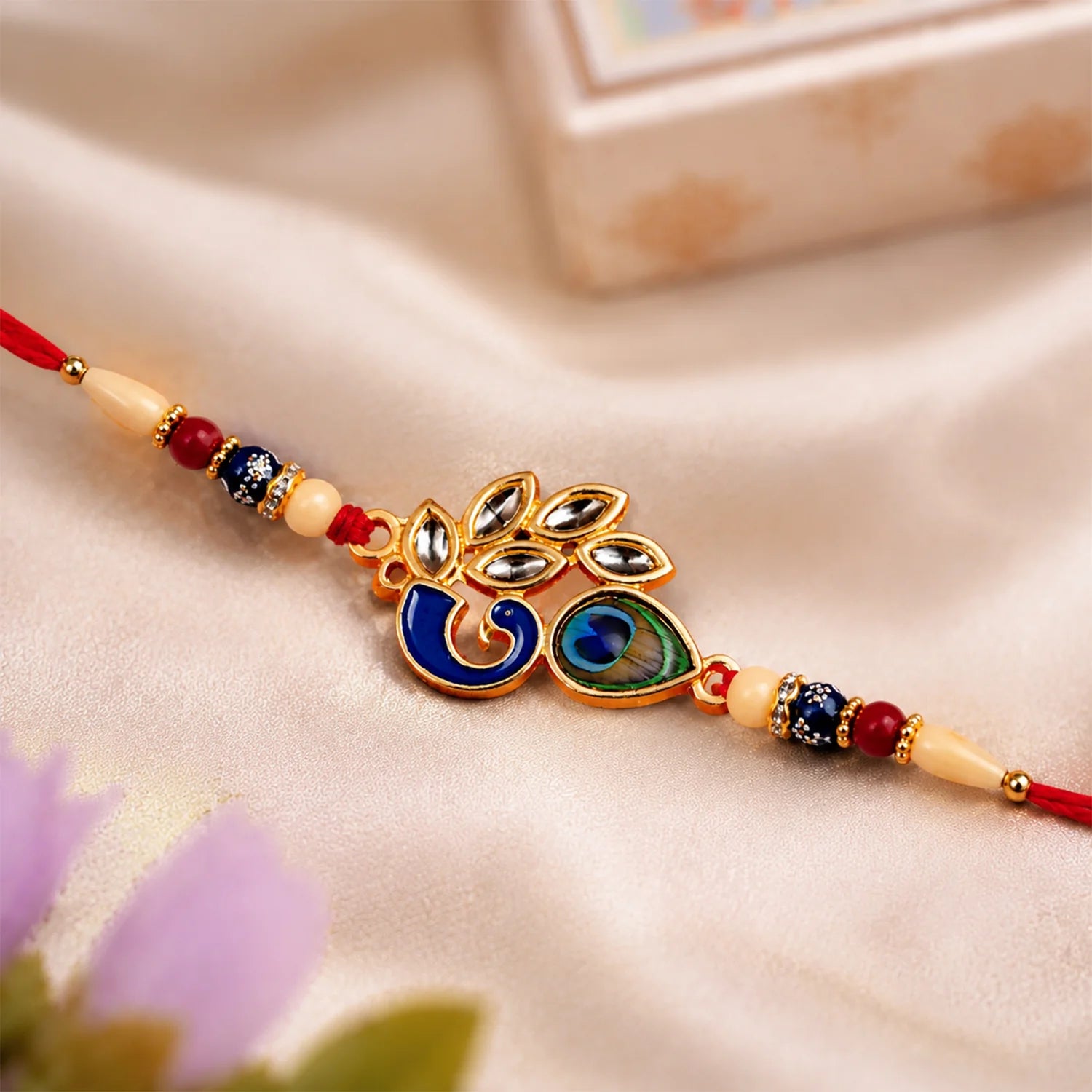 Mor Pankh Rakhi – Vibrant Traditional Enamel For Sibling Bond