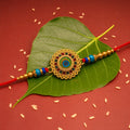 Traditional Flower Design Golden Rakhi – Festive Elegance & Blessings